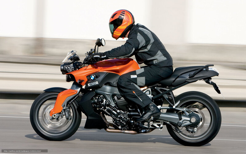 Motorcyclist on Orange Bike — Dynamic, Afternoon