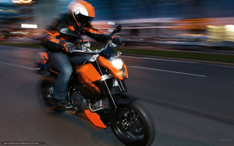 Motorcyclist on Orange Bike — Dynamic, Night