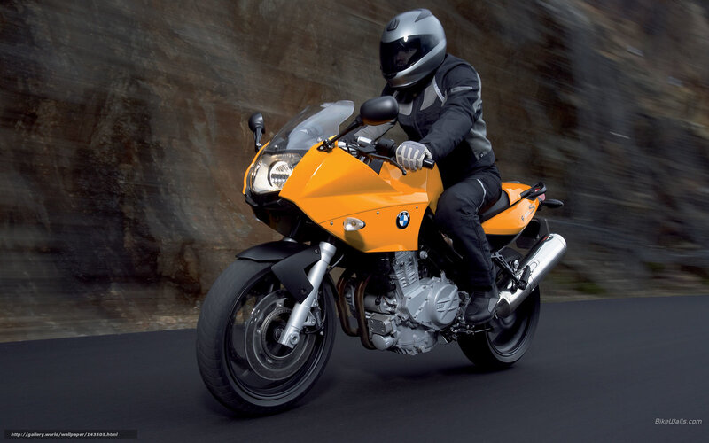 Motorcyclist on Orange Bike — Dynamic, Photograph, Helmet, Road