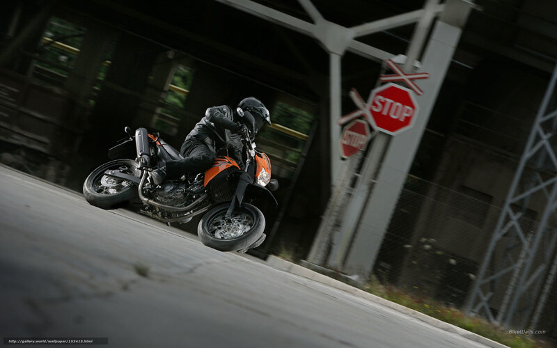 Motorcyclist on Orange Bike — Dynamic, Photograph, Stop Sign