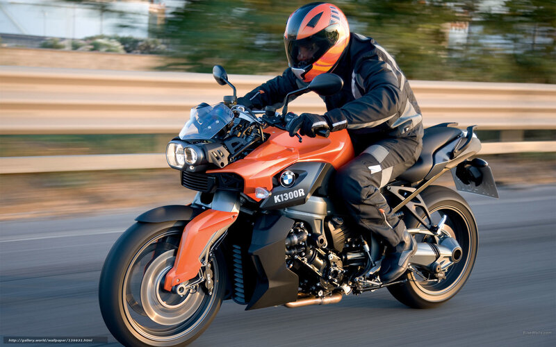 Motorcyclist on Orange Bike — Dynamic