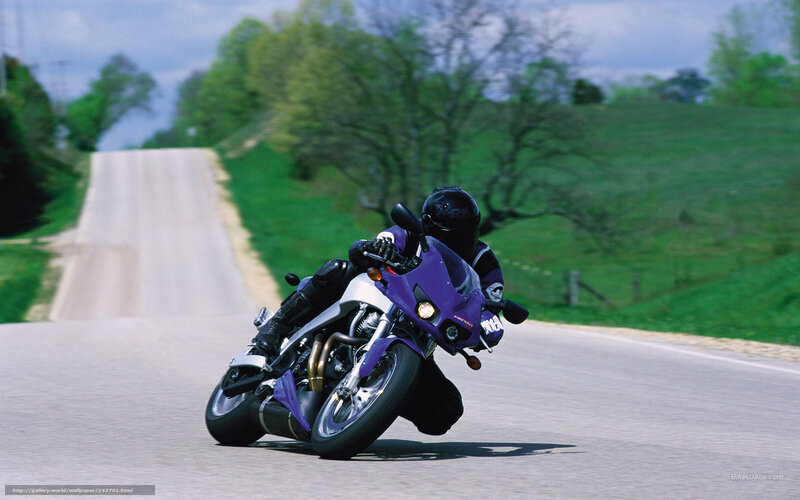 Motorcyclist on Purple Bike — Dynamic