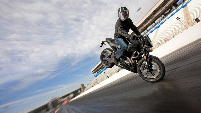 Motorcyclist on Racetrack — Black, Dynamic, Afternoon, Photograph
