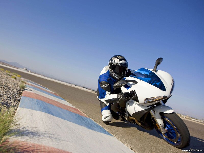 Motorcyclist on Racetrack — Blue