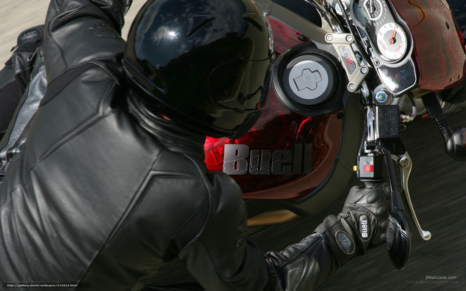motorcyclist on red bike