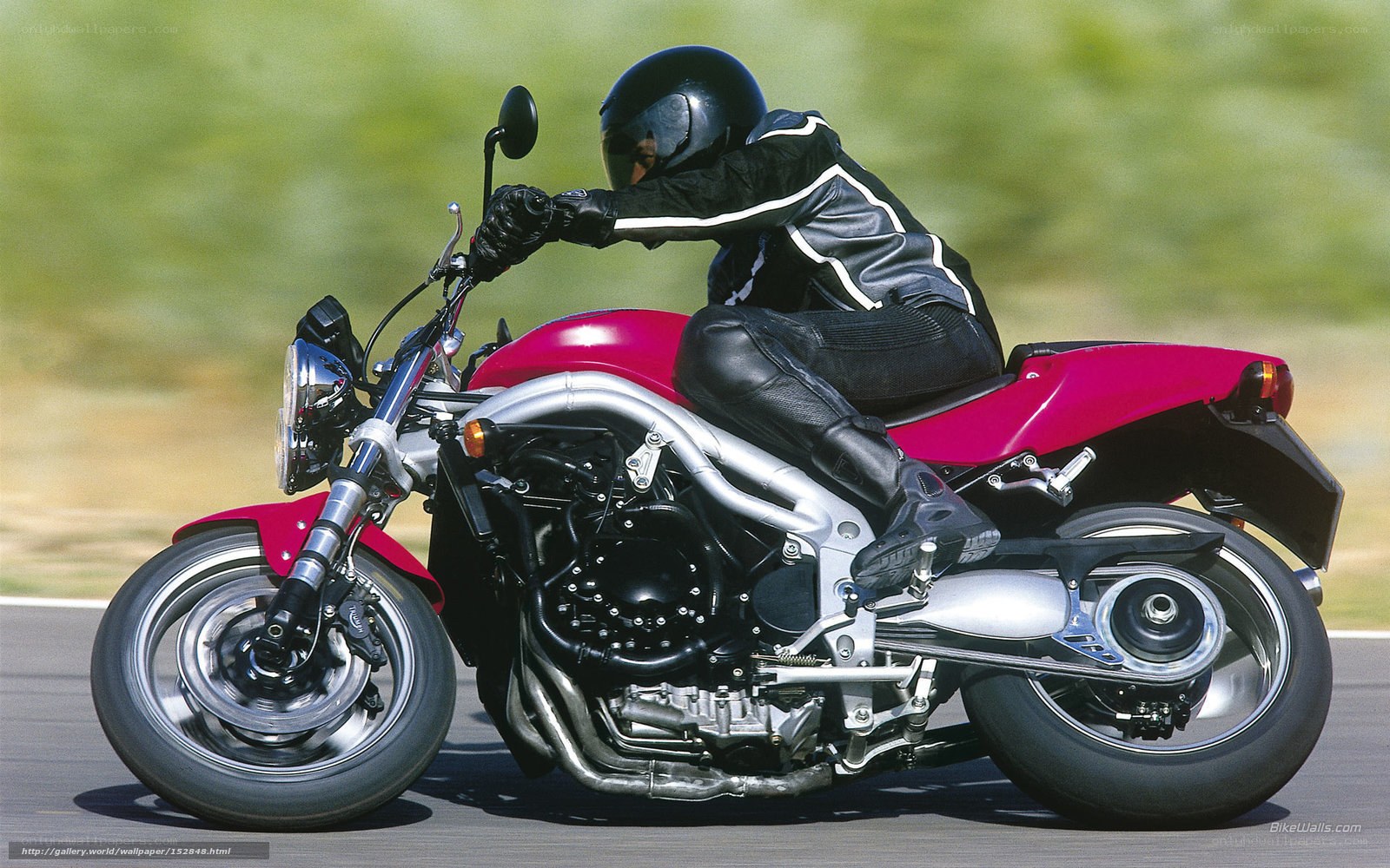 motorcyclist on red bike