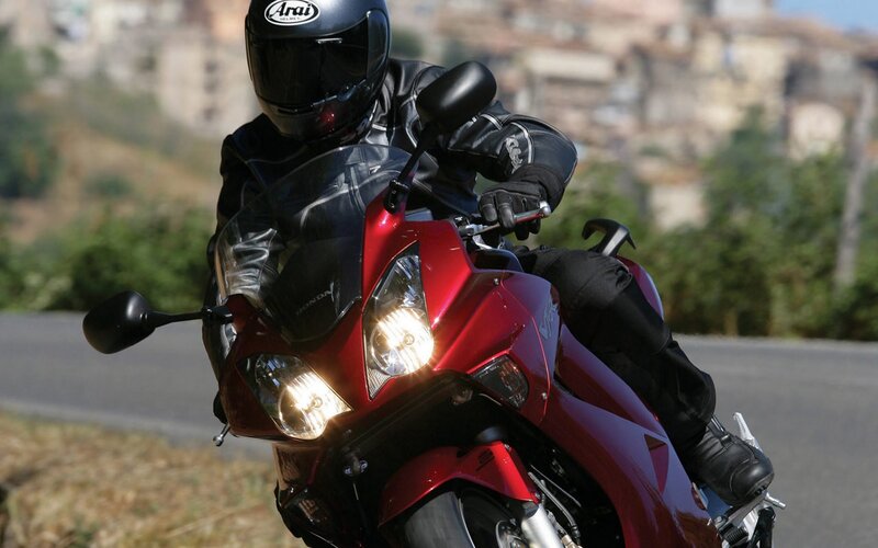 Motorcyclist on red bike