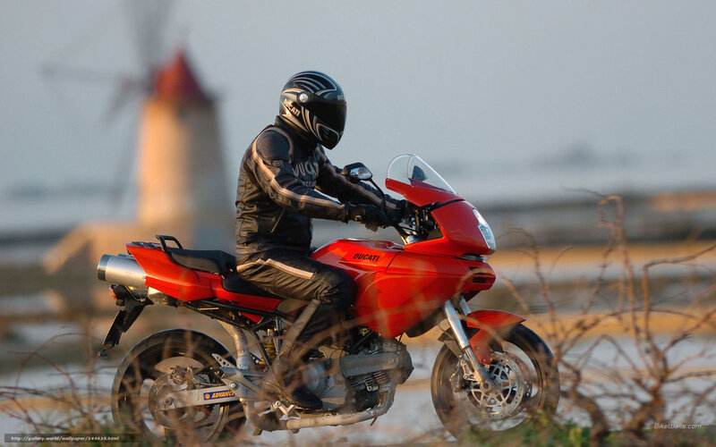 Motorcyclist on Red Bike — Calm