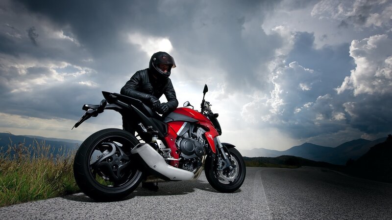 Motorcyclist on Red Bike — Dramatic, Afternoon, Photograph, Road