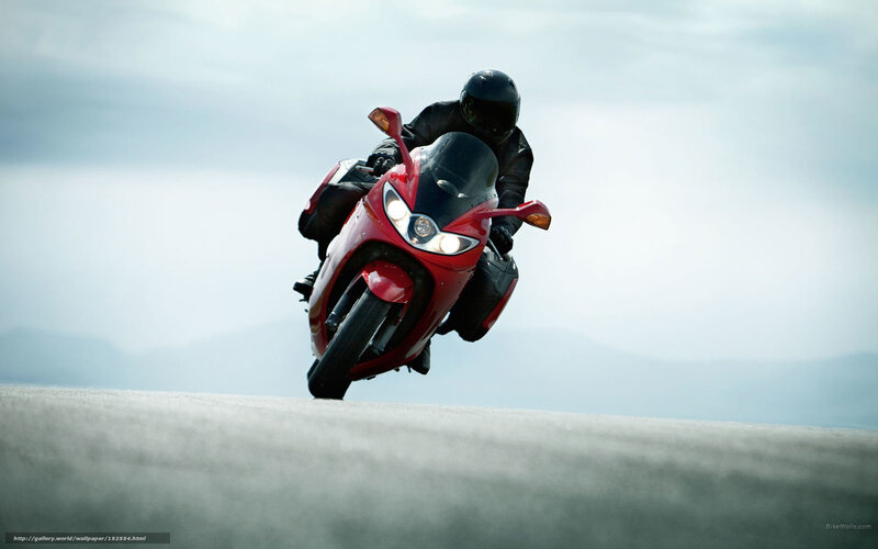 Motorcyclist on Red Bike — Dramatic, Photograph