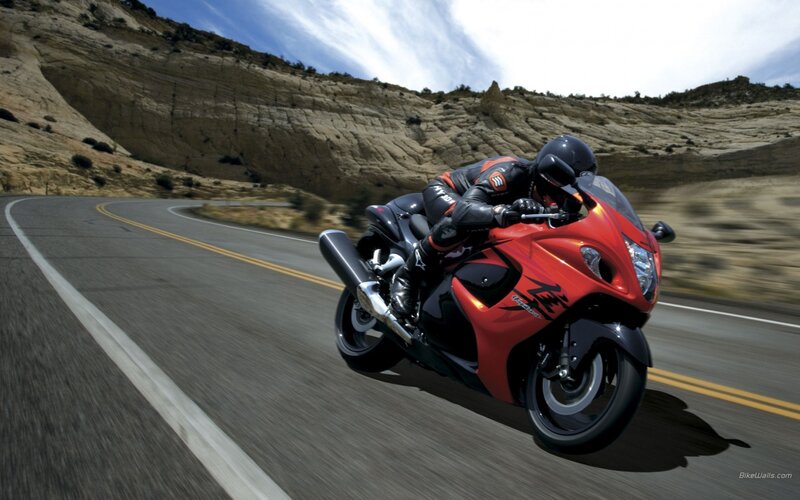 Motorcyclist on Red Bike — Dynamic, Afternoon, Photograph, Road, Cliffs, Helmet
