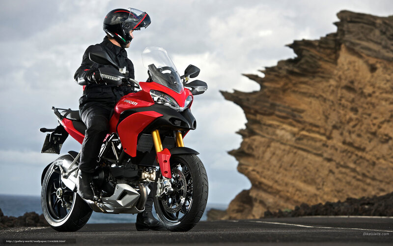 Motorcyclist on red Ducati