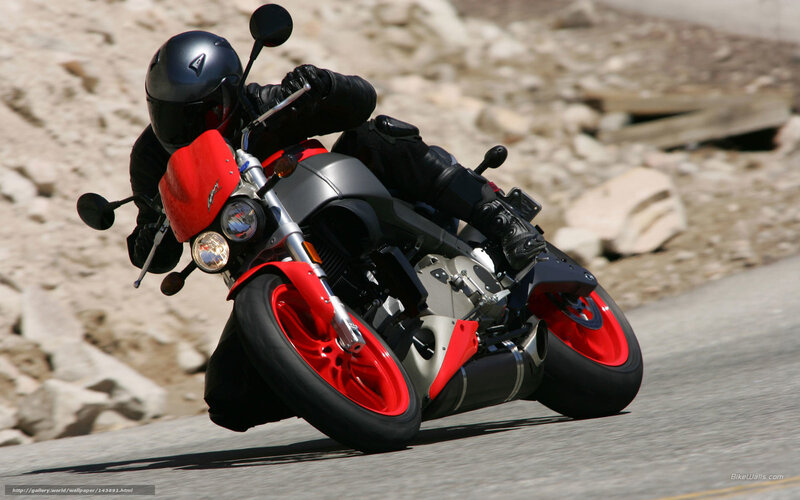 Motorcyclist on Red Motorcycle — Dynamic