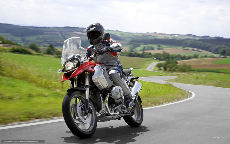 Motorcyclist on Red Motorcycle — Green