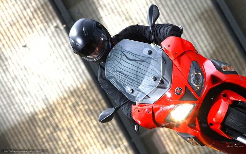 Motorcyclist on Red Scooter — Dynamic