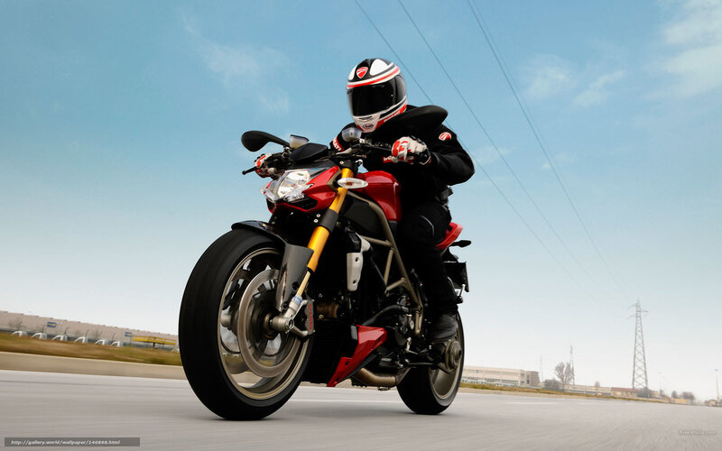 motorcyclist on red sportbike