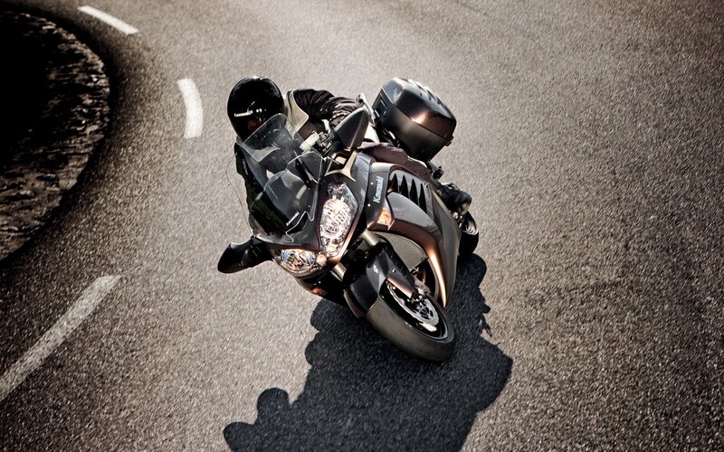 Motorcyclist on Road — Black, Dramatic, Afternoon, Photograph, Motorcycle, Helmet