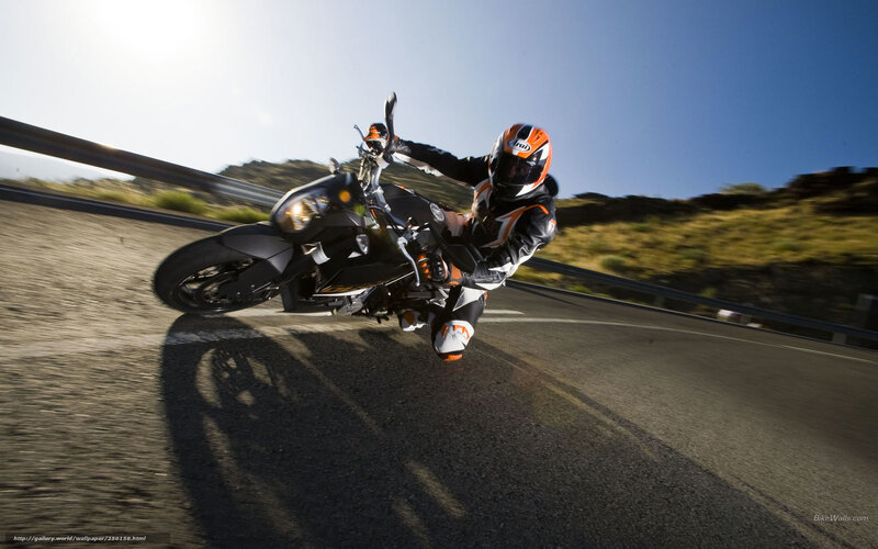 Motorcyclist on Road — Black, Dynamic, Afternoon, Photograph, Guardrail, Hill