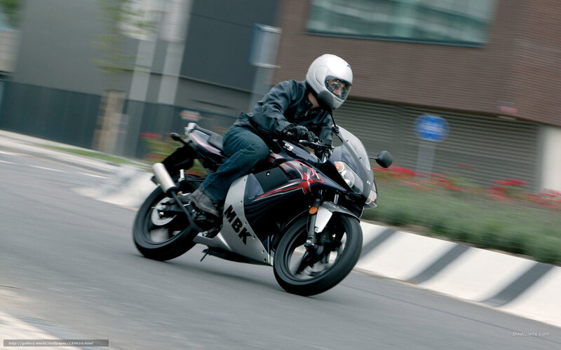 Motorcyclist on Road — Black, Dynamic, Afternoon, Photograph, Helmet, Building