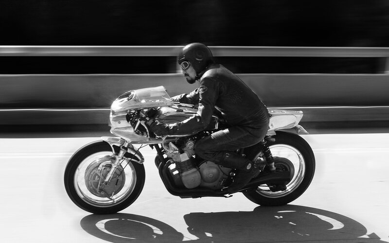 Motorcyclist on Road — Black, Dynamic, Afternoon, Photograph, Helmet, Goggles, White