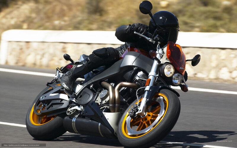 Motorcyclist on Road — Black, Dynamic, Afternoon, Photograph, Helmet, Guardrail