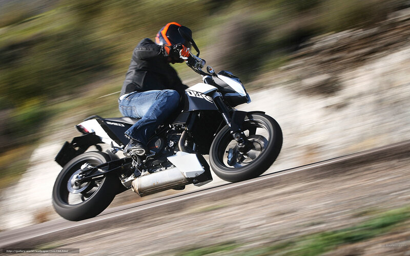 Motorcyclist on Road — Black, Dynamic, Afternoon, Photograph, Helmet, Jeans