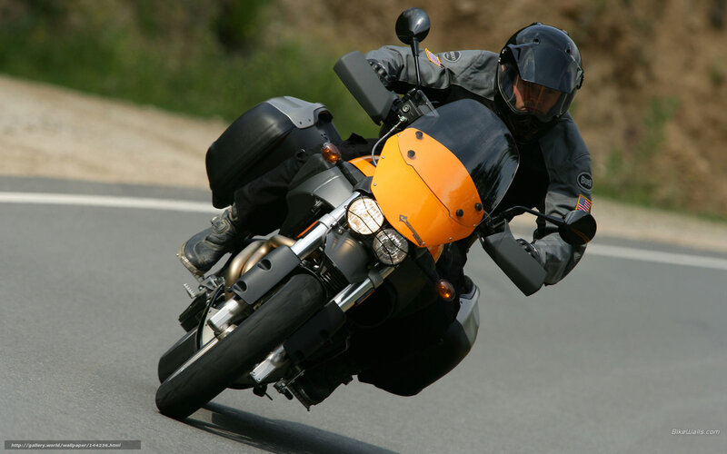 Motorcyclist on Road — Black, Dynamic, Afternoon, Photograph, Helmet, Saddlebags