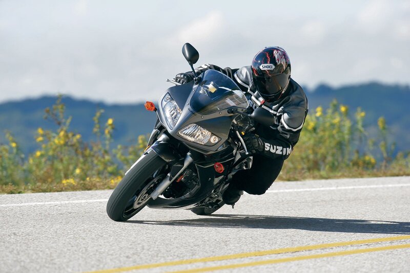 Motorcyclist on Road — Black, Dynamic, Afternoon, Photograph, Mountains, Flowers