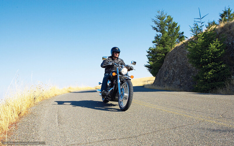 Motorcyclist on Road — Blue, Serene