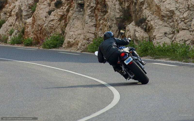 Motorcyclist on Road — Gray, Dynamic, Afternoon, Photograph, Cliff