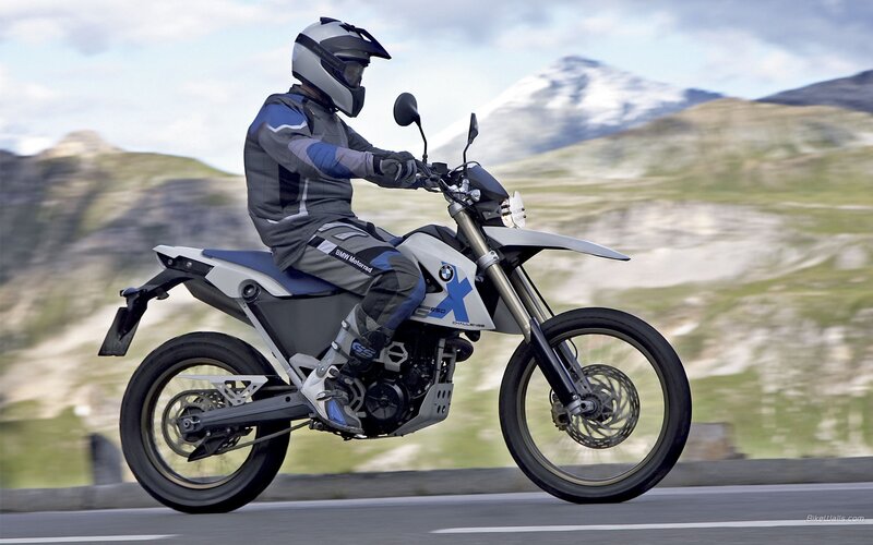 Motorcyclist on Road — Gray, Dynamic, Afternoon, Photograph, Mountains, Helmet