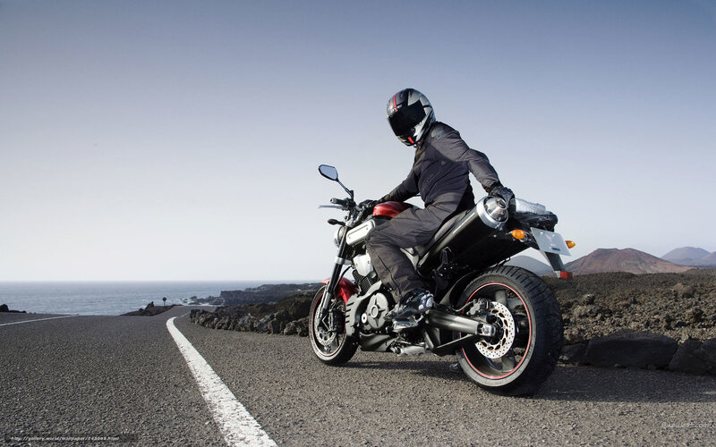 Motorcyclist on Road — Gray, Serene