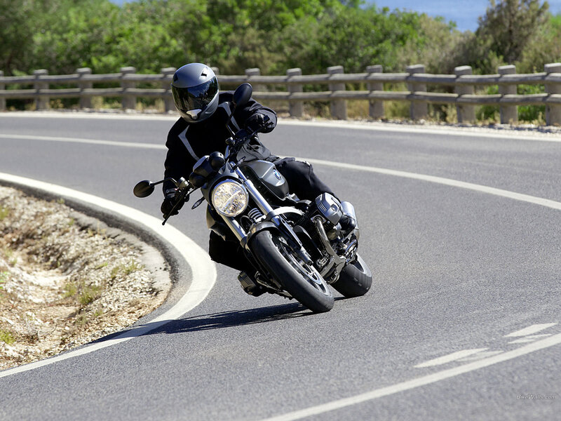 Motorcyclist on Road — Gray