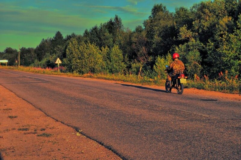 Motorcyclist on Road — Green, Calm
