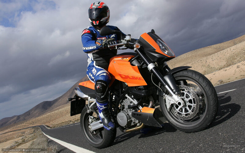 Motorcyclist on Road — Orange, Dramatic, Afternoon