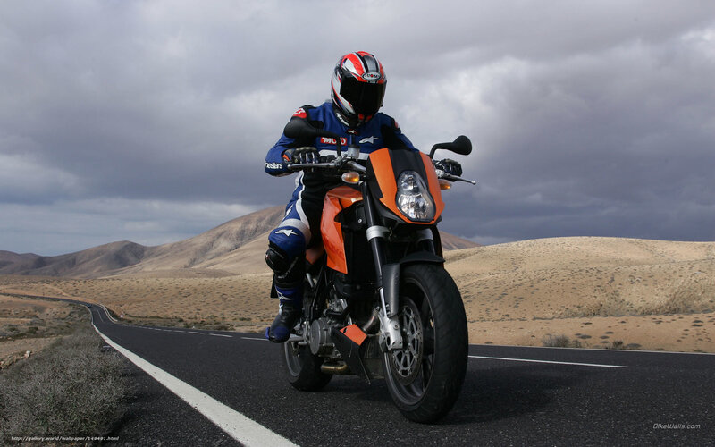 Motorcyclist on Road — Orange, Dramatic, Photograph