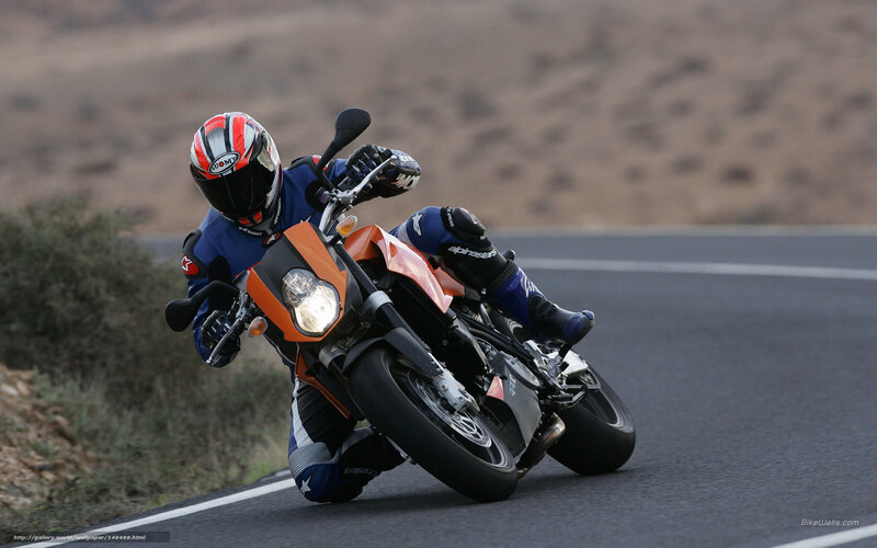 Motorcyclist on Road — Orange, Dynamic, Afternoon, Photograph, Helmet, Bushes