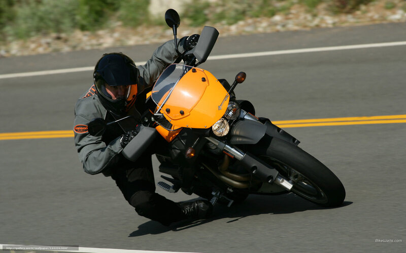 Motorcyclist on Road — Orange, Dynamic, Afternoon