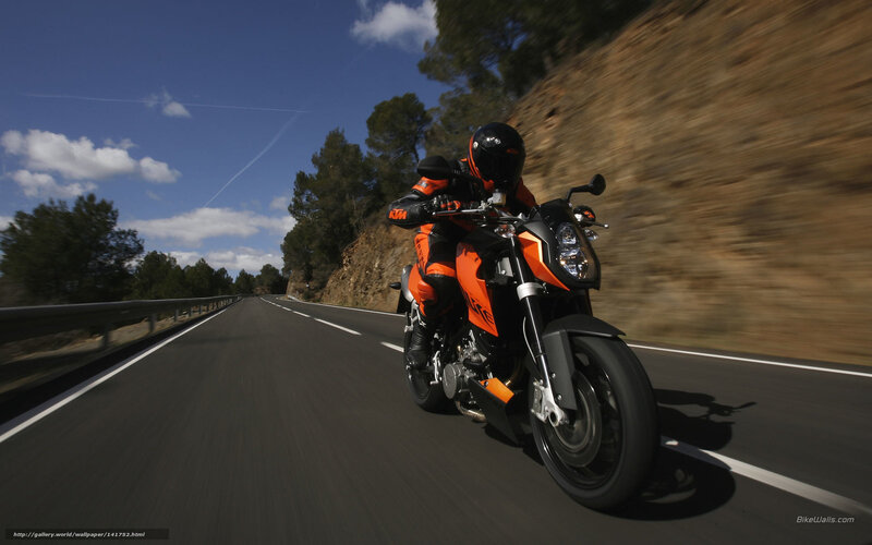 Motorcyclist on Road — Orange