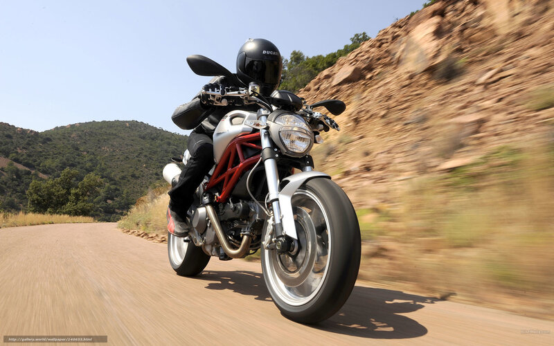 Motorcyclist on Road — Silver