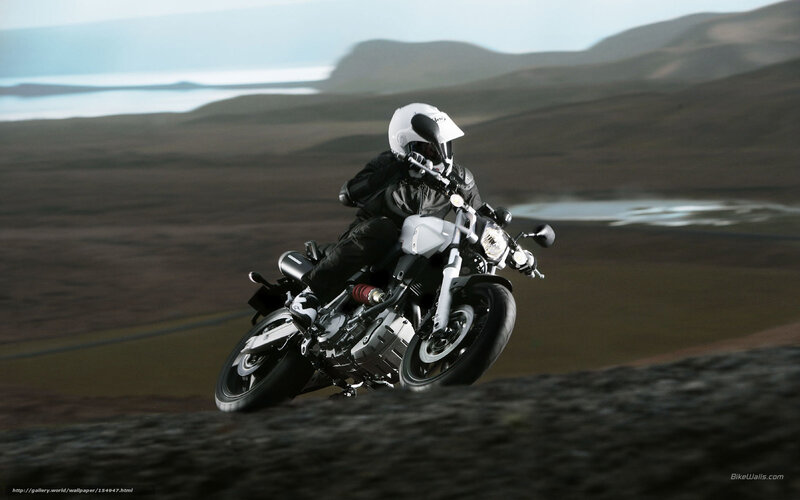 Motorcyclist on Road — White, Dramatic, Photograph