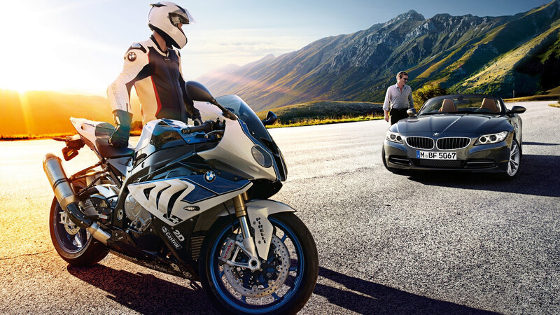 Motorcyclist on Road — White, Dramatic