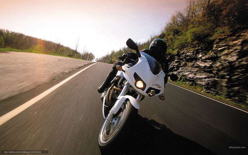 Motorcyclist on Road — White, Dynamic, Sunset