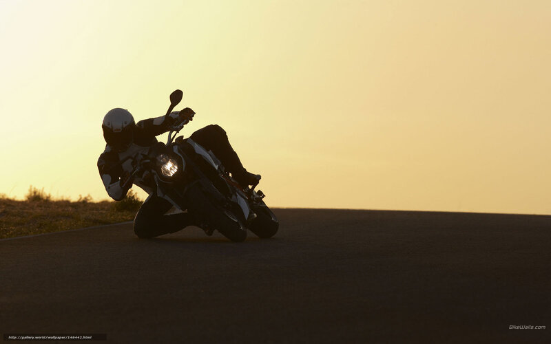 Motorcyclist on Road — Yellow, Dramatic, Sunset
