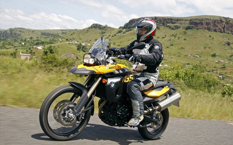 Motorcyclist on Road — Yellow