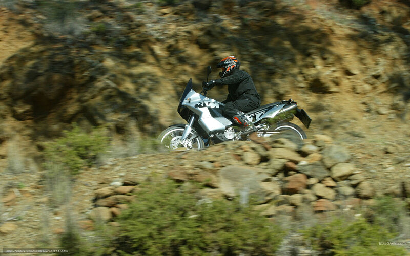 Motorcyclist on Rocky Terrain — Silver