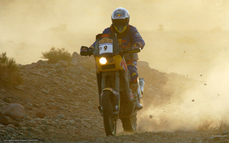 Motorcyclist on Rocky Terrain — Yellow