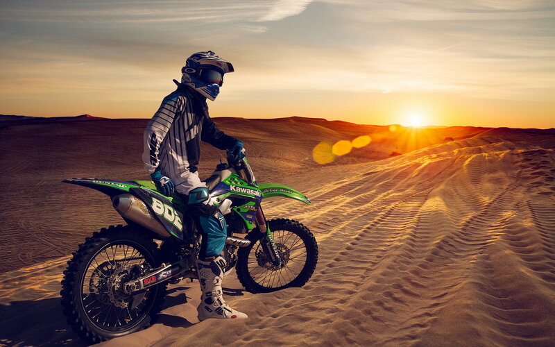 Motorcyclist on Sand Dune — Orange, Dramatic