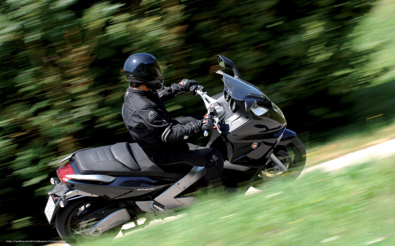Motorcyclist on Scooter
