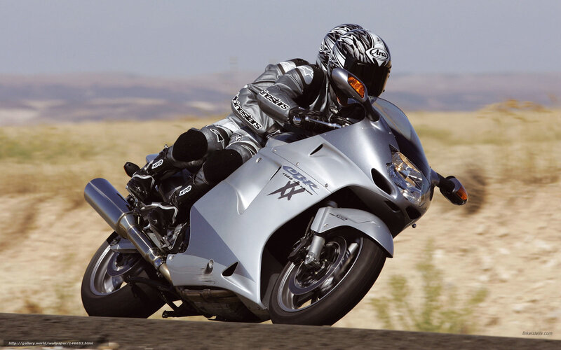 Motorcyclist on Silver Bike — Dynamic, Afternoon, Photograph, Rider
